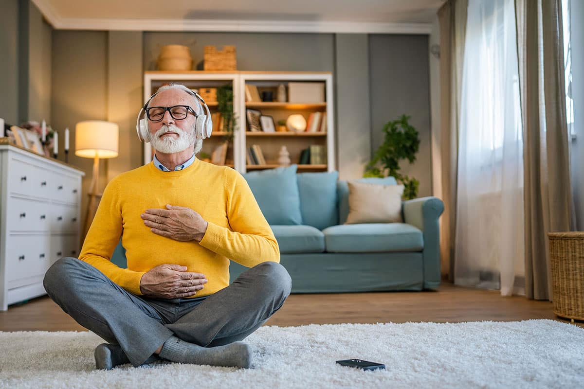 An old man meditating,